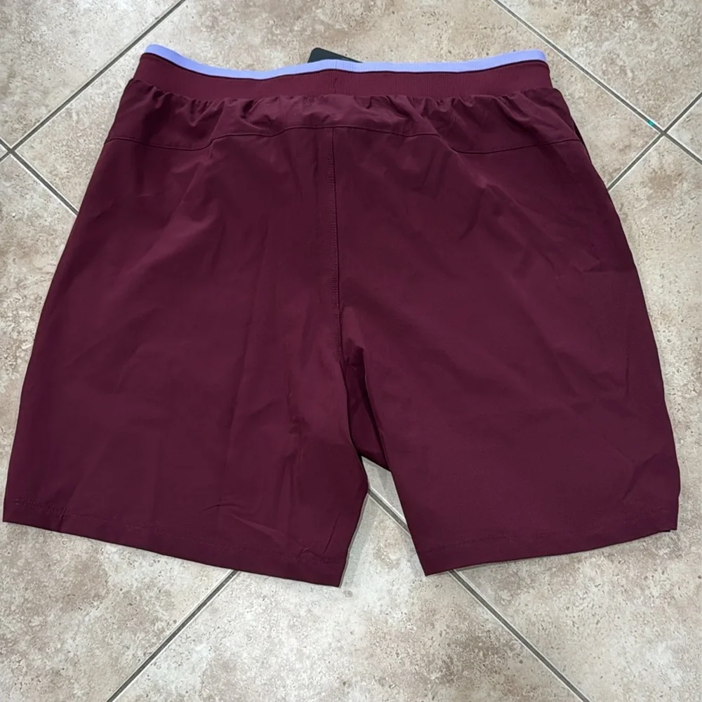 Fabletics Men's Burgundy Athletic 7 inch Shorts with Lavender Waistband NWT - Picture 11 of 11